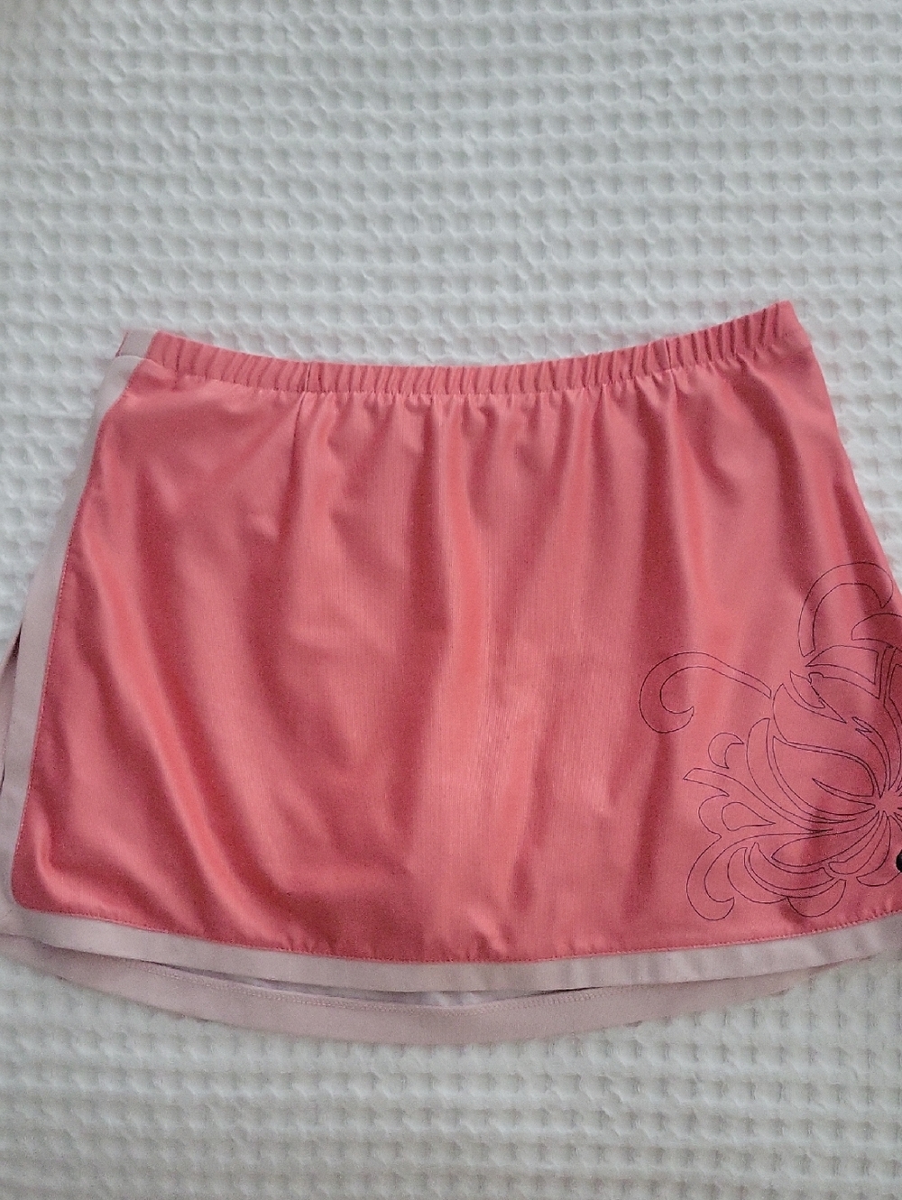 Nike Coral Skort with Subtle Floral Outline